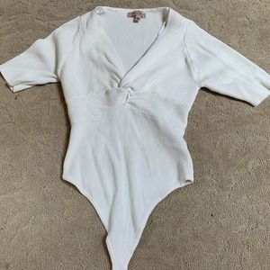 White ribbed thong body suit,